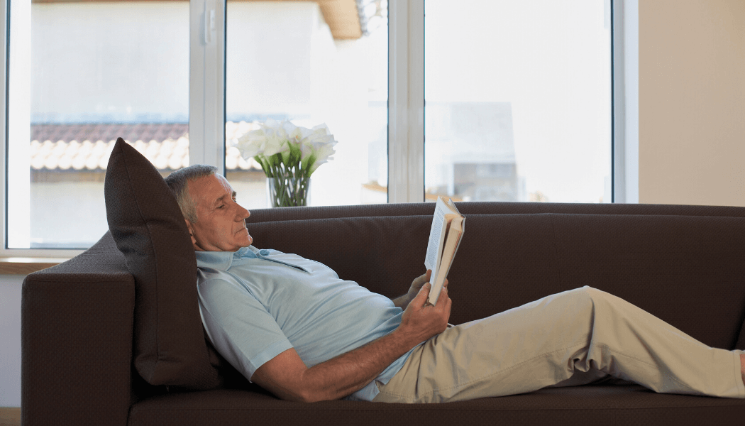 Man-Reading-on-Couch