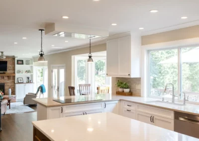 AFTER - light and bright kitchen with raised ceiling to provide visual flow into breakfast nook