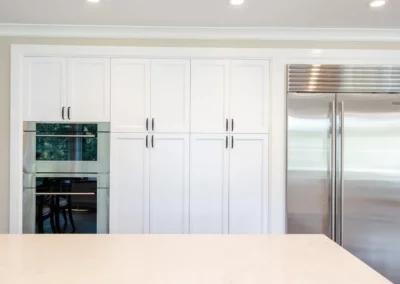 AFTER - seamless integration of appliances and custom cabinetry