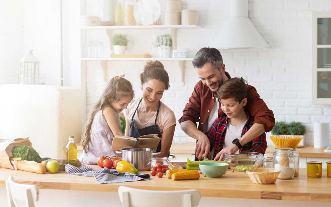 Family cooking together in kitchen