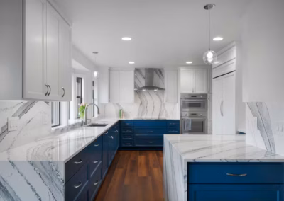 Modern Blue Kitchen Remodel with Statement Waterfall Countertop in Snohomish, WA