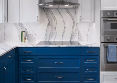 Modern Blue Kitchen Remodel with Statement Waterfall Countertop in Snohomish, WA