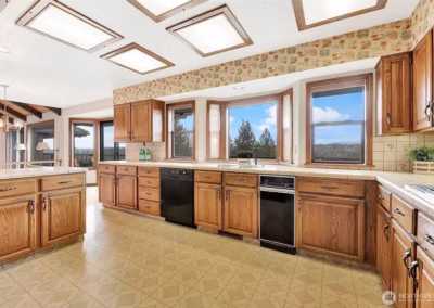 Before - Modern Blue Kitchen Remodel with Statement Waterfall Countertop in Snohomish, WA