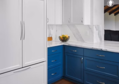 Modern Blue Kitchen Remodel with Statement Waterfall Countertop in Snohomish, WA